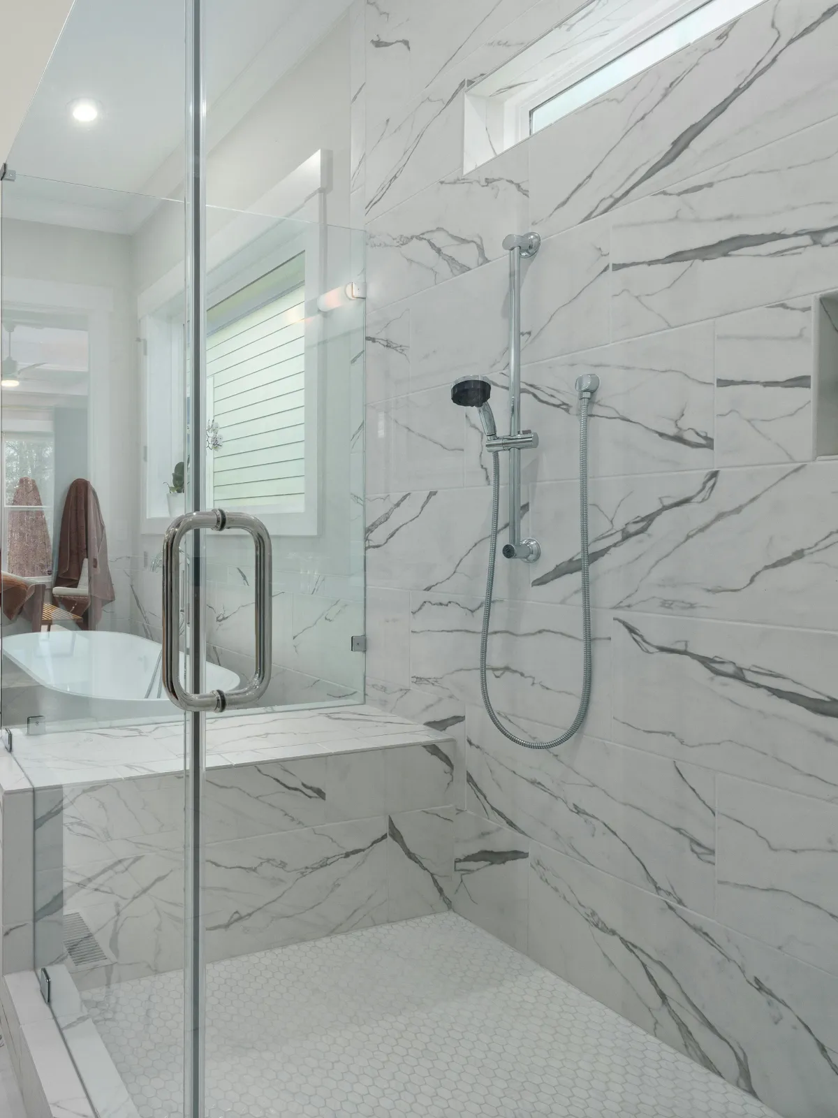 Glass shower enclosure